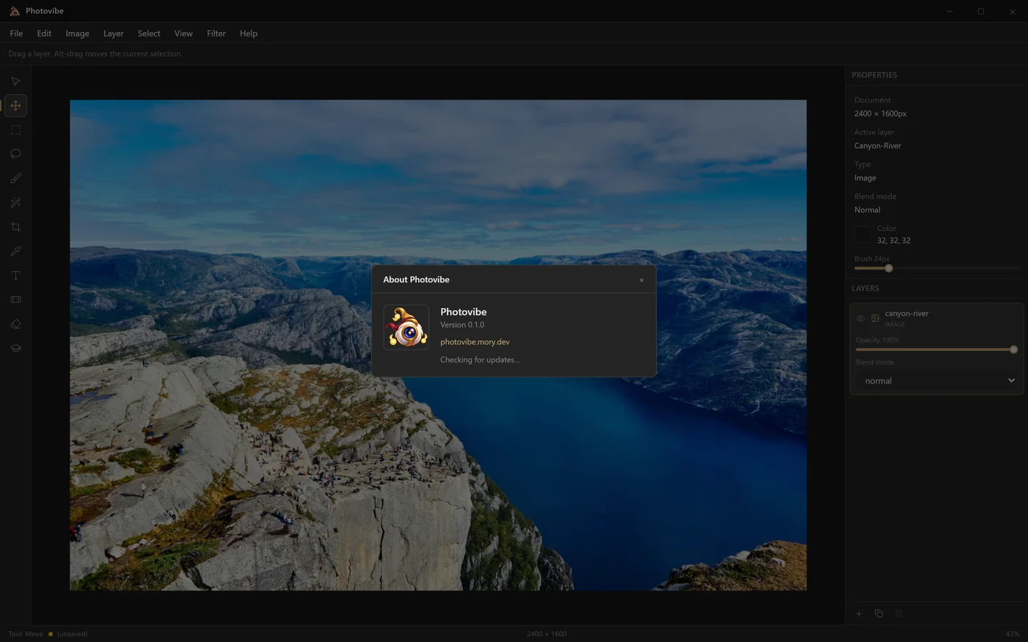 The About Photovibe dialog showing the version number and an update check against GitHub Releases